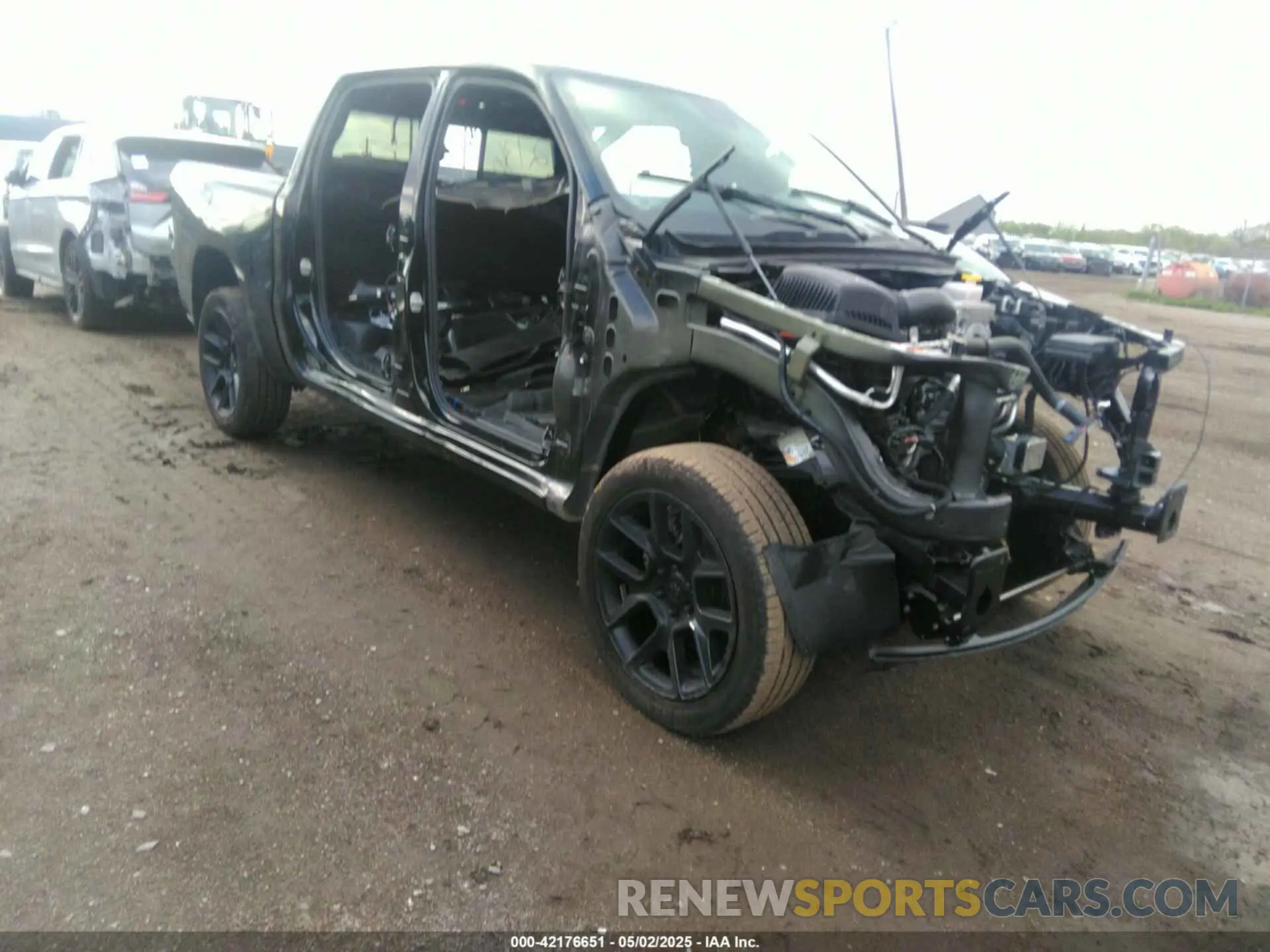 1 Photograph of a damaged car 1C6SRFJT6RN192736 RAM 1500 2024