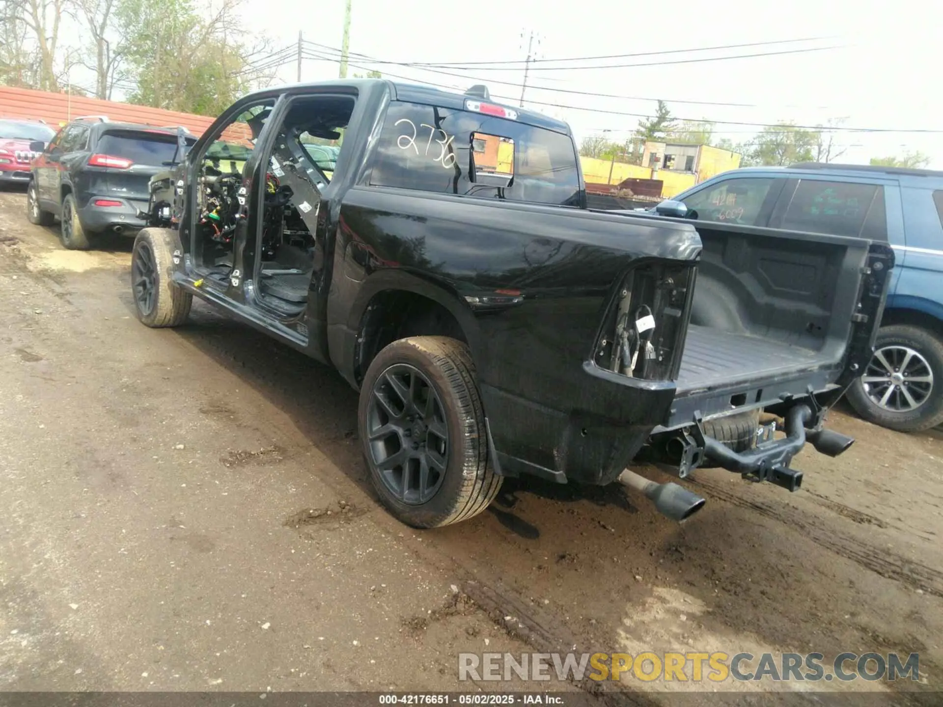 3 Photograph of a damaged car 1C6SRFJT6RN192736 RAM 1500 2024