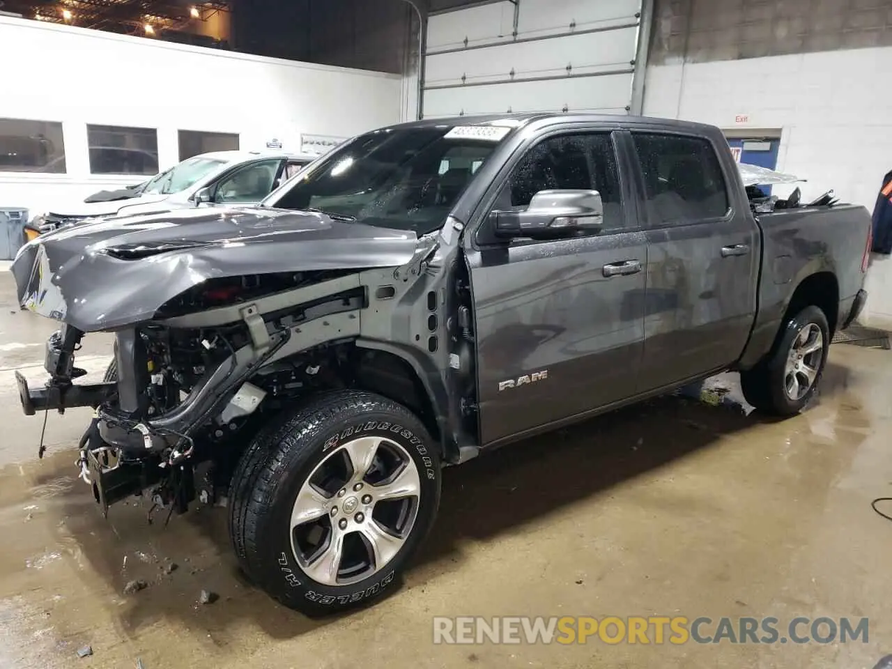 1 Photograph of a damaged car 1C6SRFJT7RN189182 RAM 1500 2024