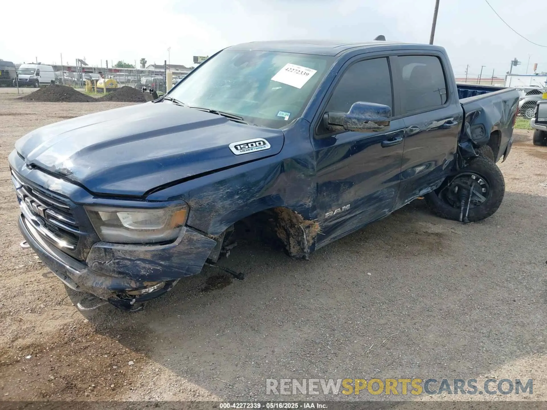 2 Photograph of a damaged car 1C6SRFJTXRN119479 RAM 1500 2024