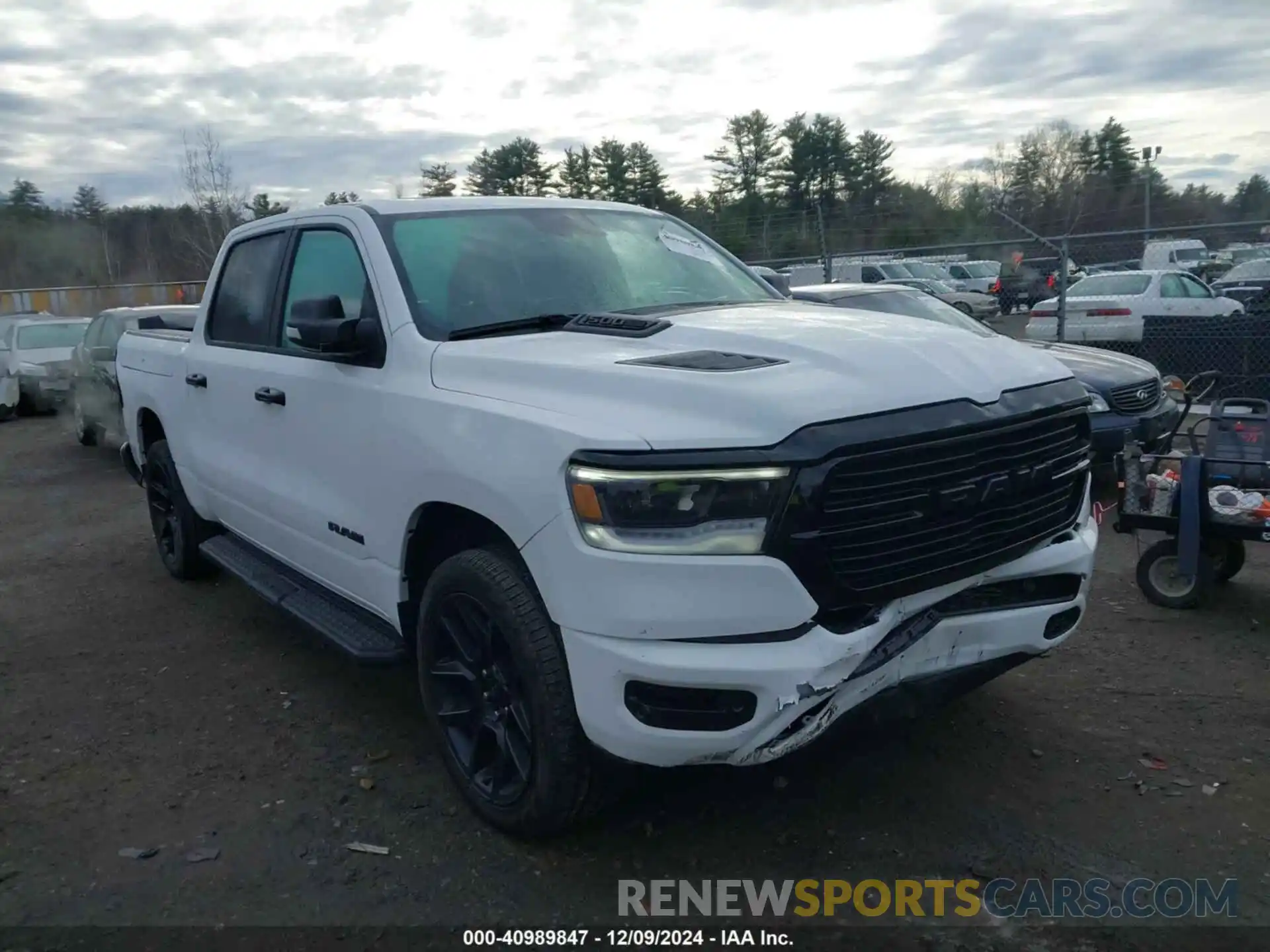 1 Photograph of a damaged car 1C6SRFJTXRN196286 RAM 1500 2024