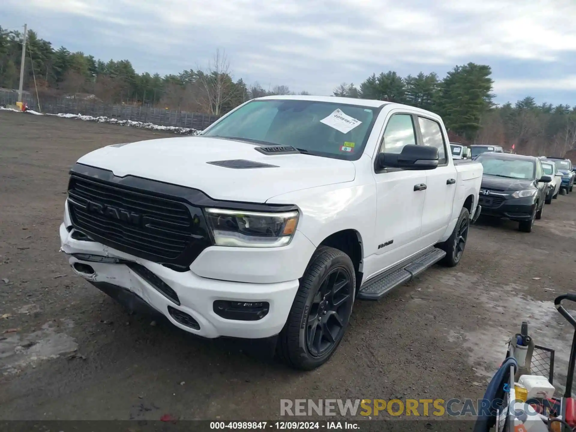 2 Photograph of a damaged car 1C6SRFJTXRN196286 RAM 1500 2024