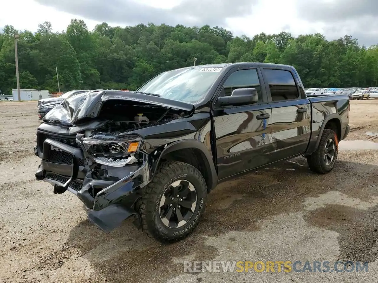 1 Photograph of a damaged car 1C6SRFLT0RN162662 RAM 1500 2024