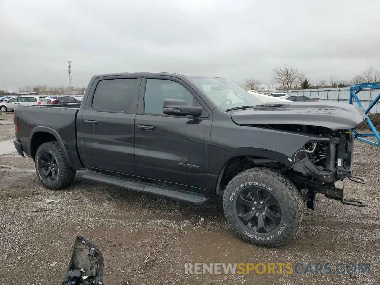 4 Photograph of a damaged car 1C6SRFLT3RN109647 RAM 1500 2024