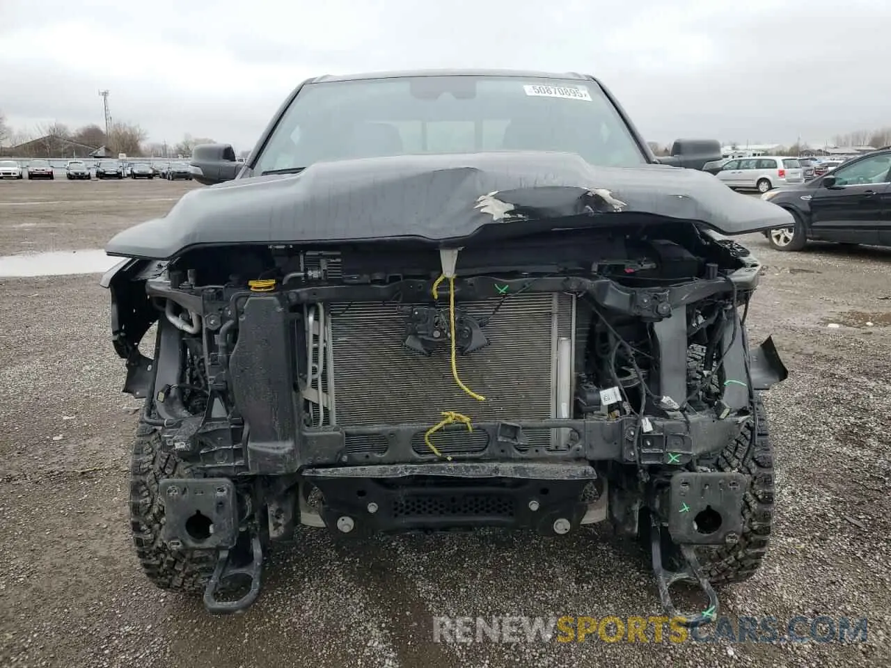 5 Photograph of a damaged car 1C6SRFLT3RN109647 RAM 1500 2024
