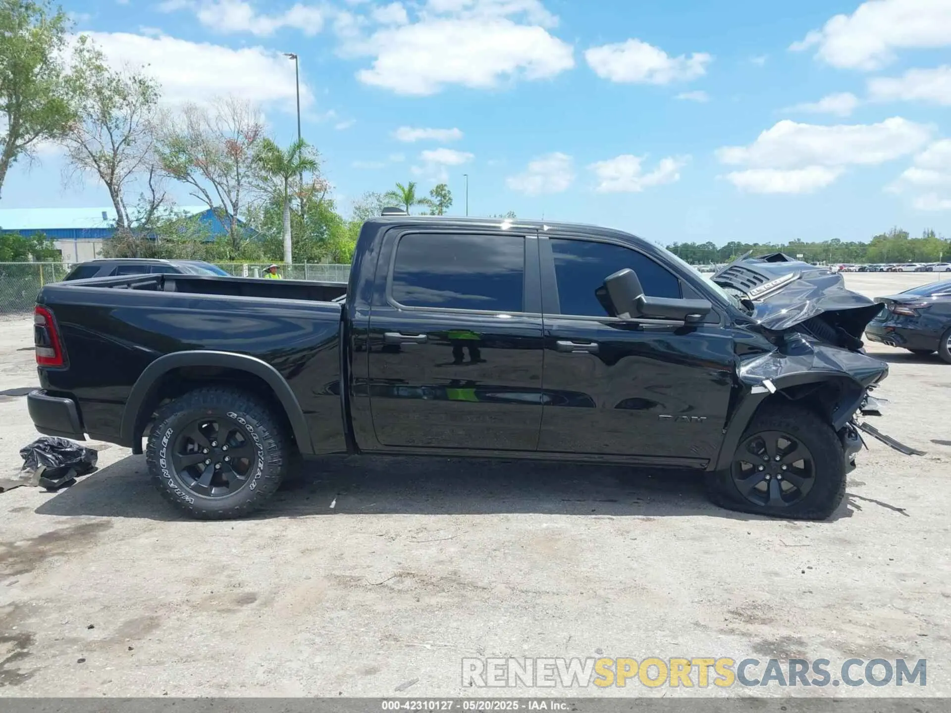 13 Photograph of a damaged car 1C6SRFLT3RN110362 RAM 1500 2024