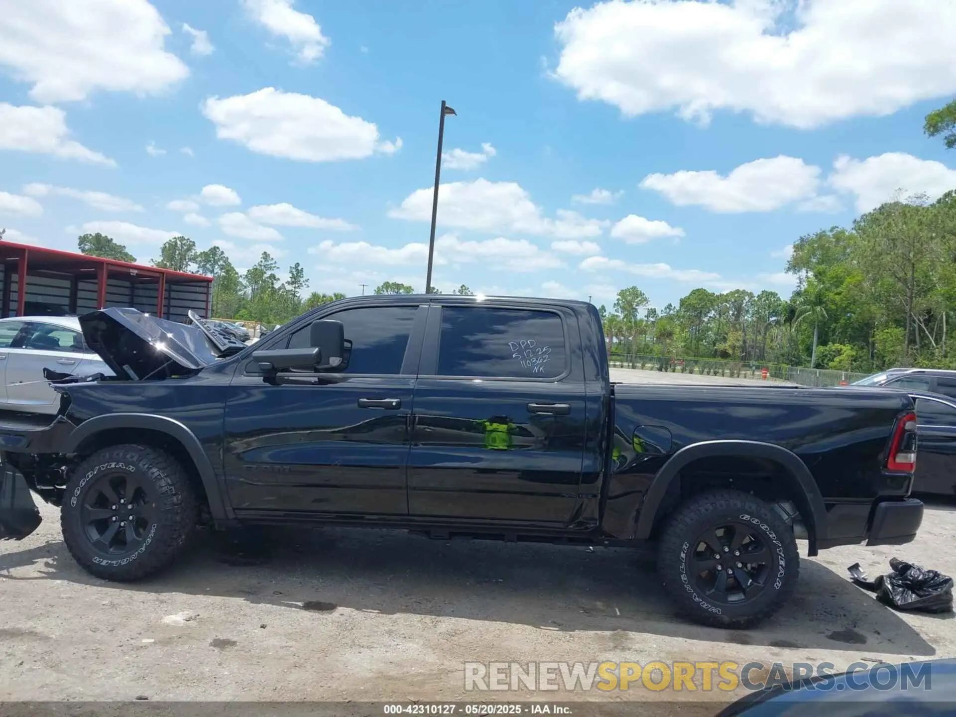 14 Photograph of a damaged car 1C6SRFLT3RN110362 RAM 1500 2024