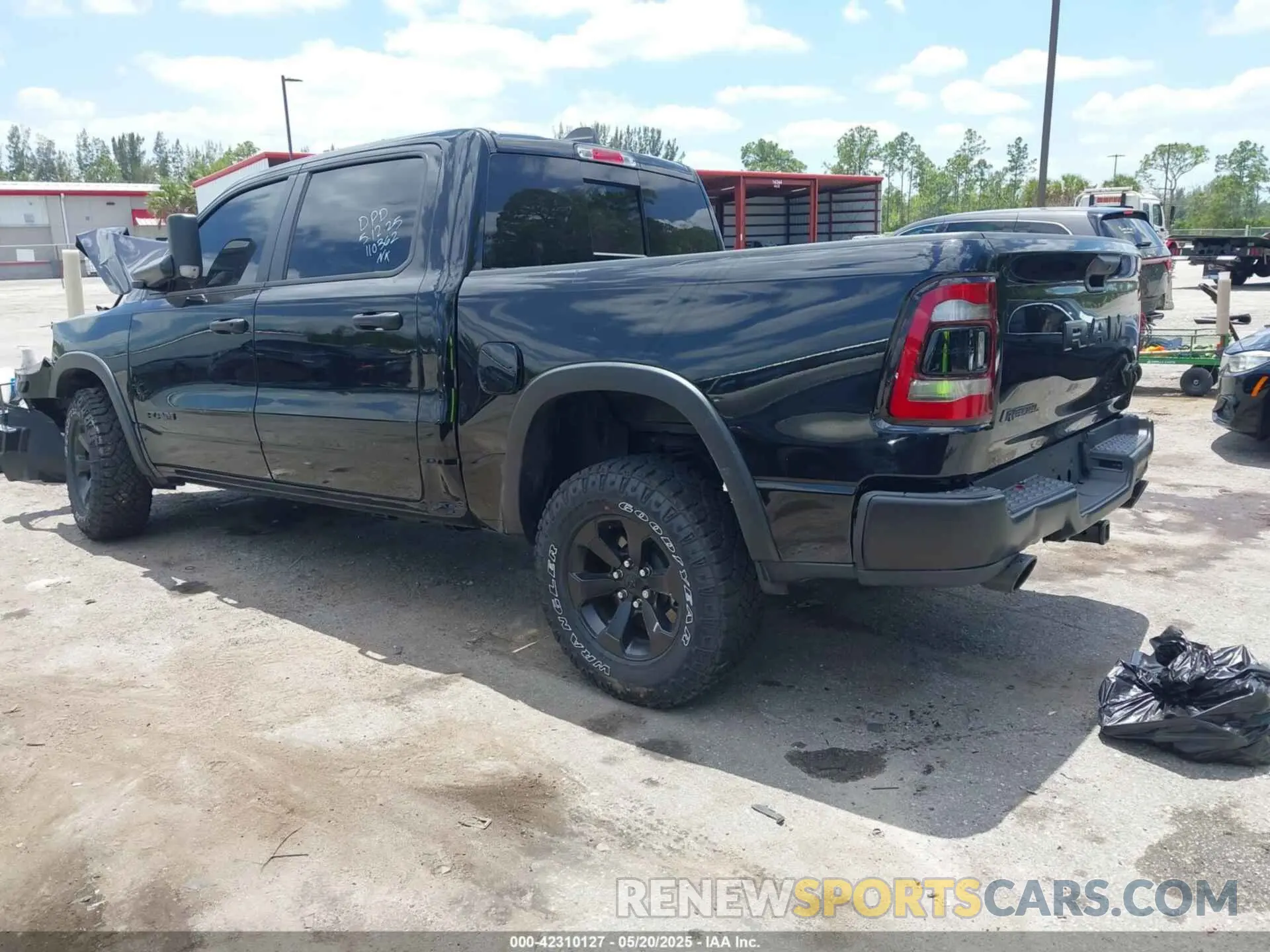3 Photograph of a damaged car 1C6SRFLT3RN110362 RAM 1500 2024