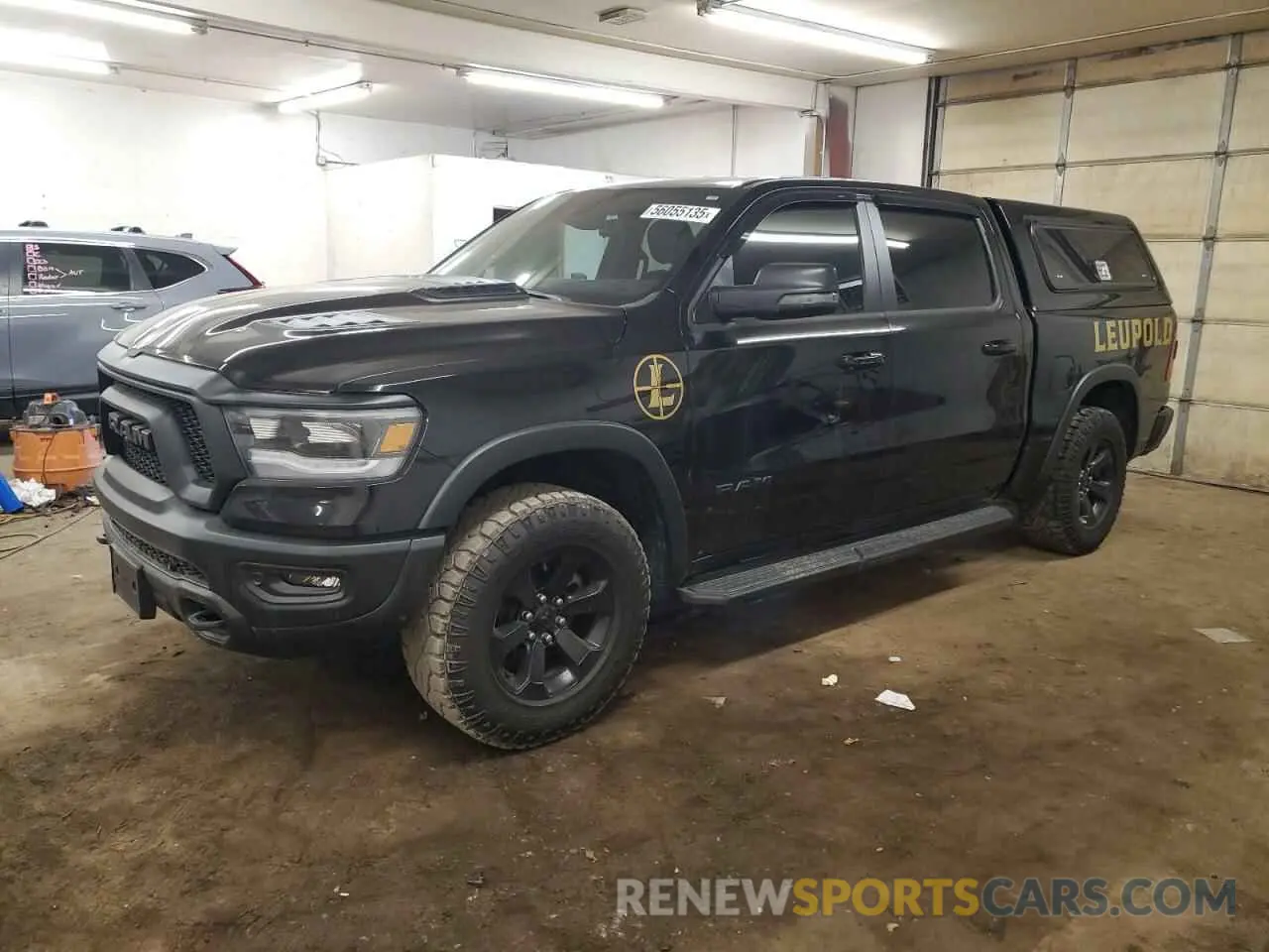 1 Photograph of a damaged car 1C6SRFLT5RN222323 RAM 1500 2024