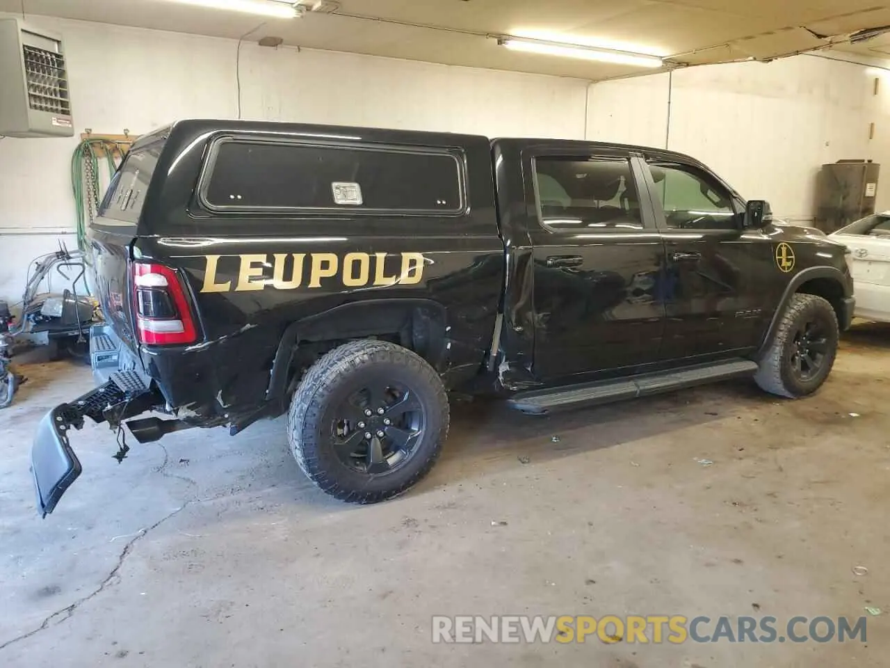 3 Photograph of a damaged car 1C6SRFLT5RN222323 RAM 1500 2024