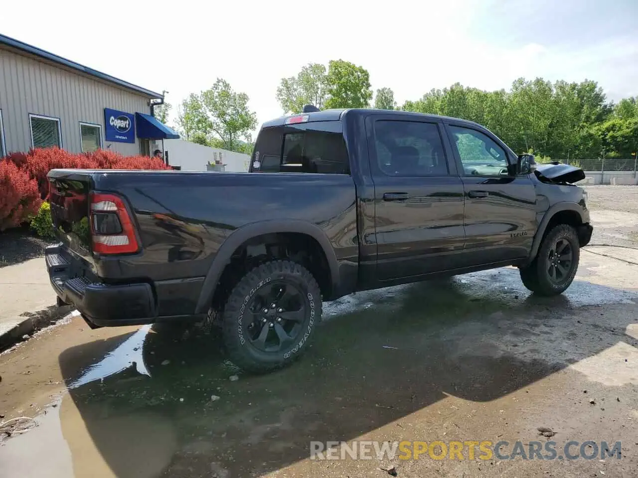 3 Photograph of a damaged car 1C6SRFLT8RN131904 RAM 1500 2024
