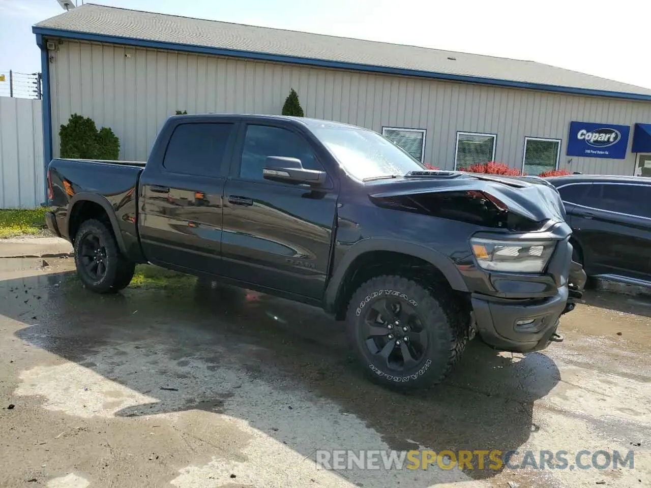 4 Photograph of a damaged car 1C6SRFLT8RN131904 RAM 1500 2024