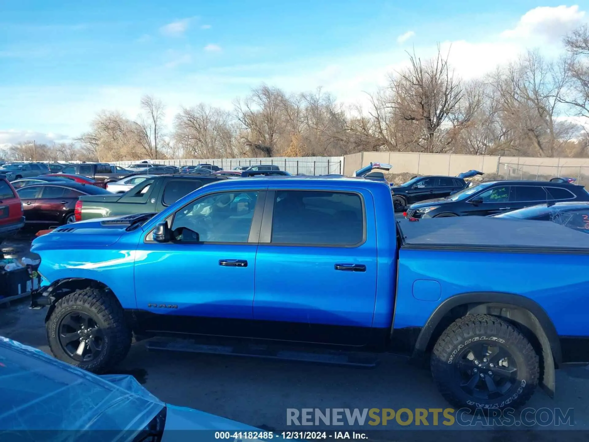 14 Photograph of a damaged car 1C6SRFLT9RN165687 RAM 1500 2024