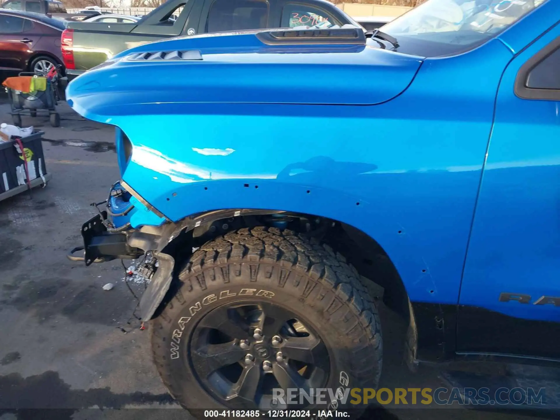 19 Photograph of a damaged car 1C6SRFLT9RN165687 RAM 1500 2024