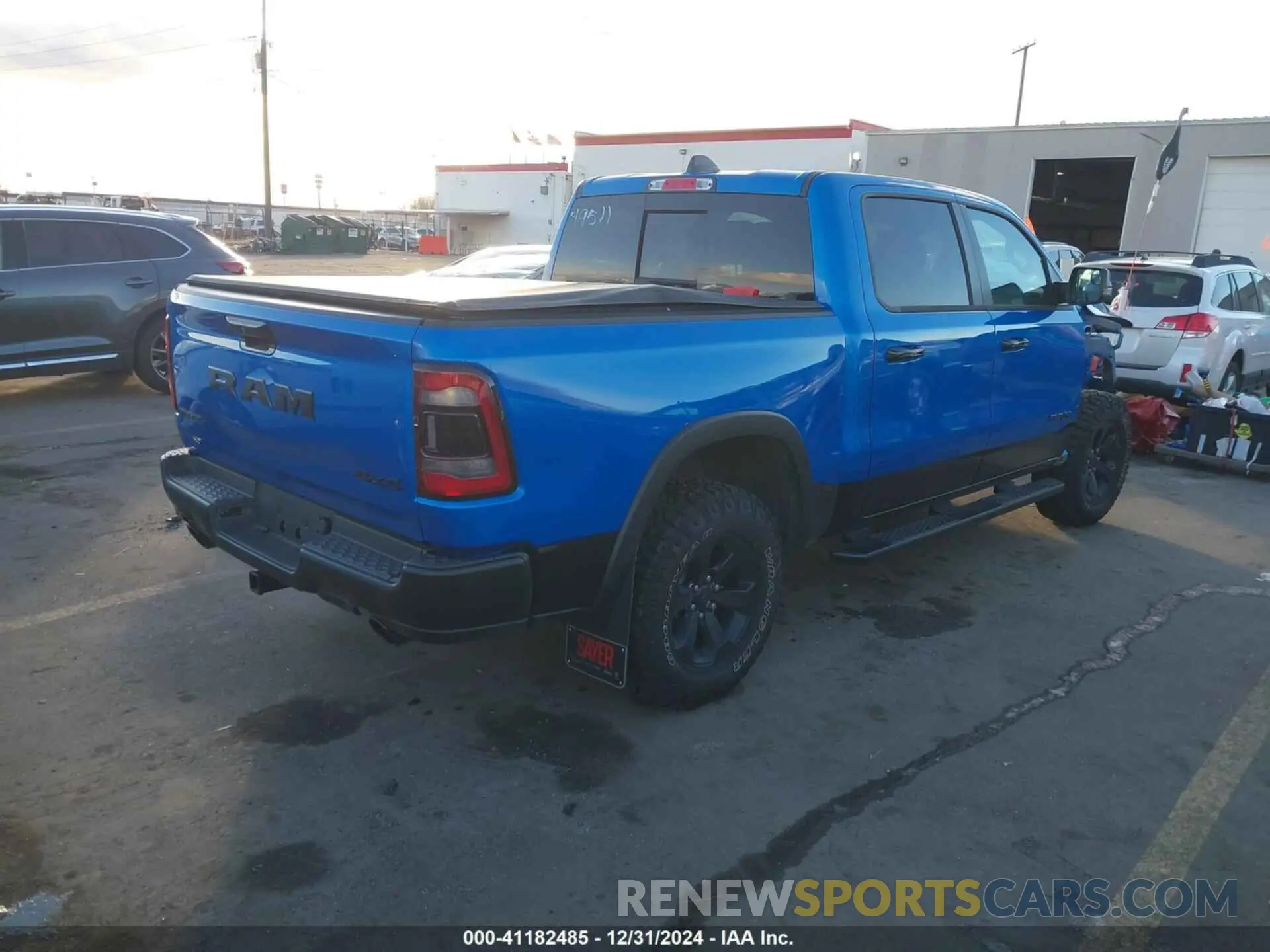 4 Photograph of a damaged car 1C6SRFLT9RN165687 RAM 1500 2024