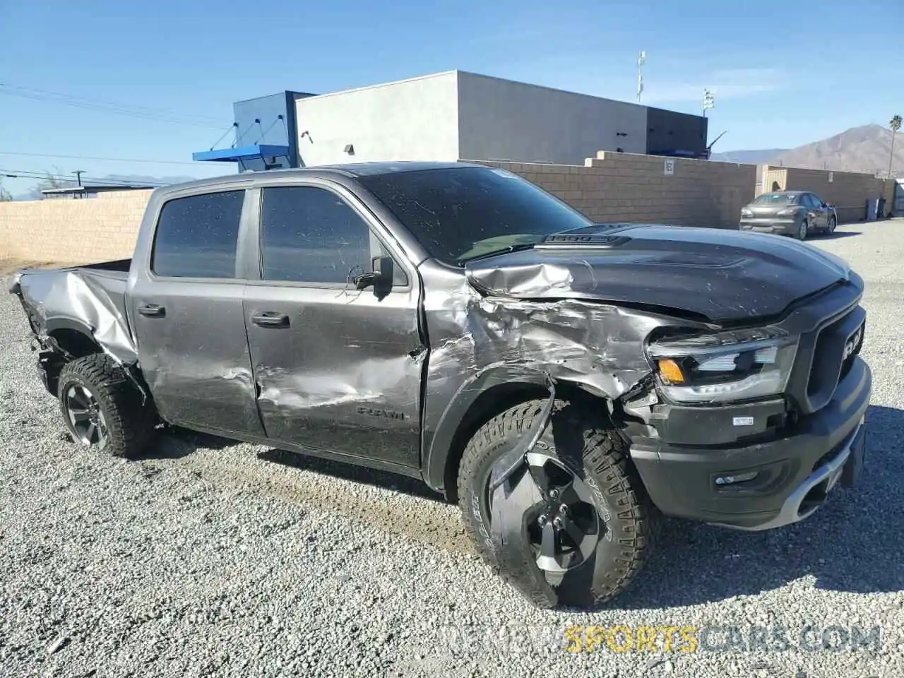 4 Photograph of a damaged car 1C6SRFLTXRN167836 RAM 1500 2024