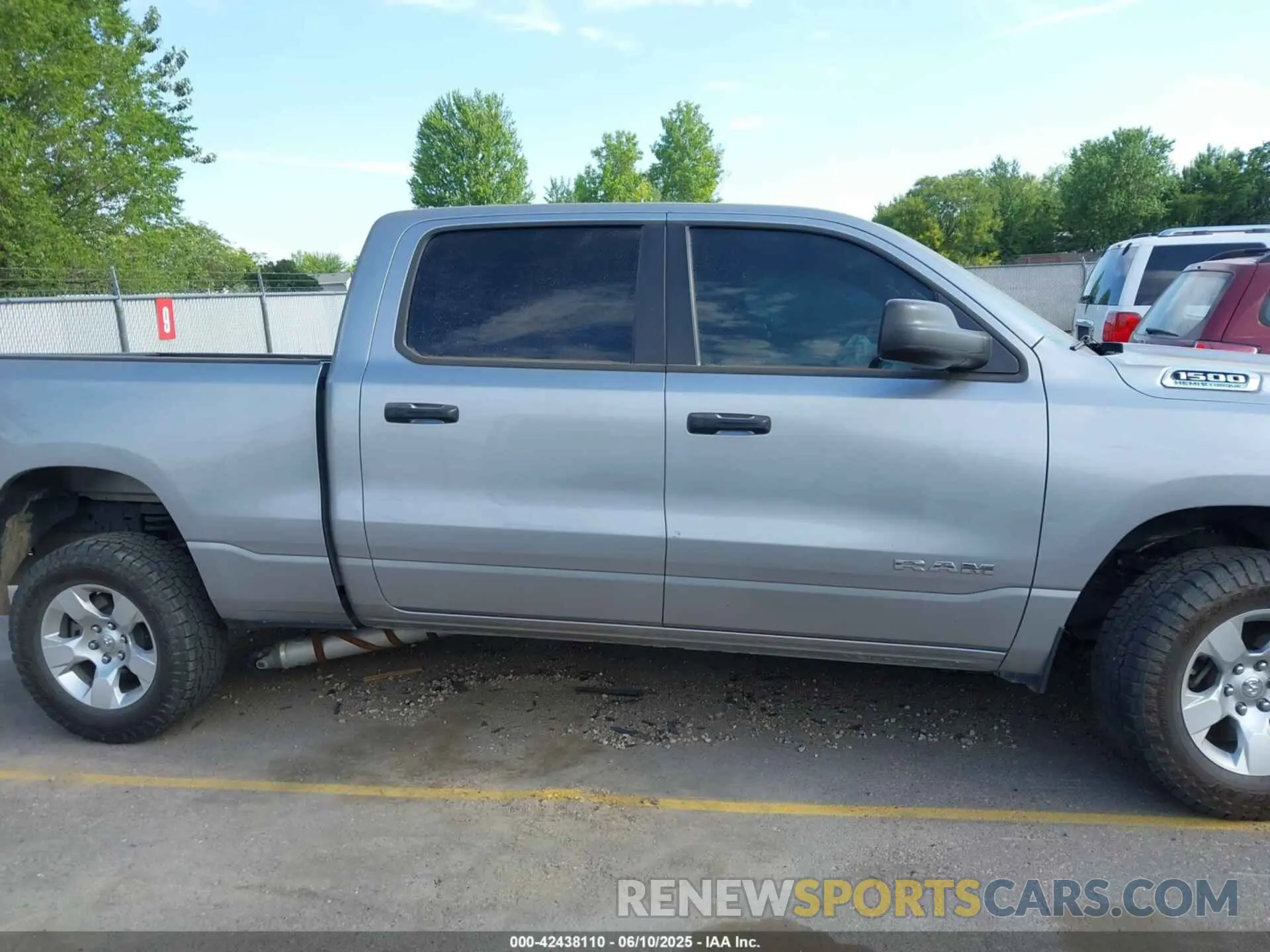 13 Photograph of a damaged car 1C6SRFMT3RN106181 RAM 1500 2024