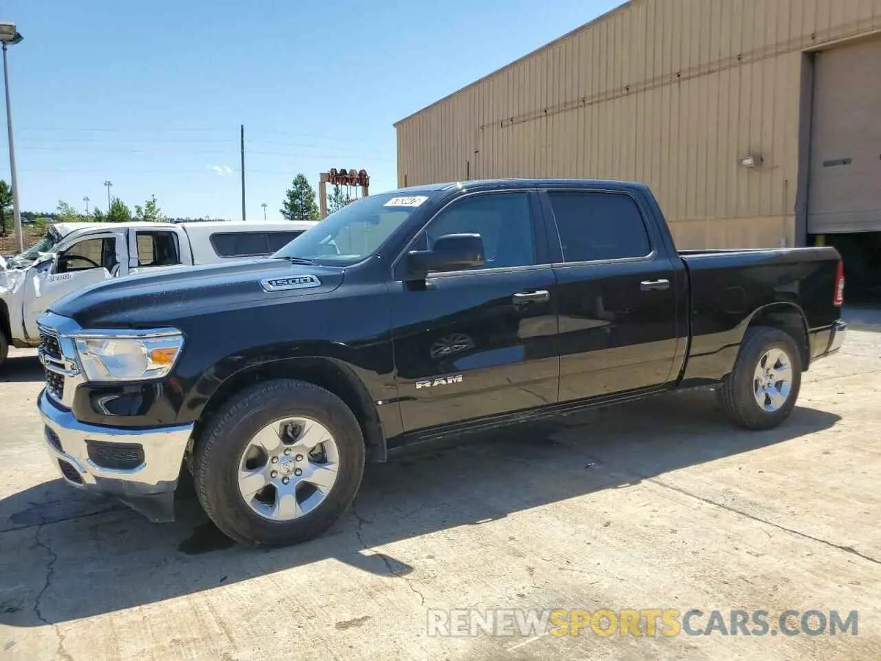1 Photograph of a damaged car 1C6SRFMT4RN170133 RAM 1500 2024