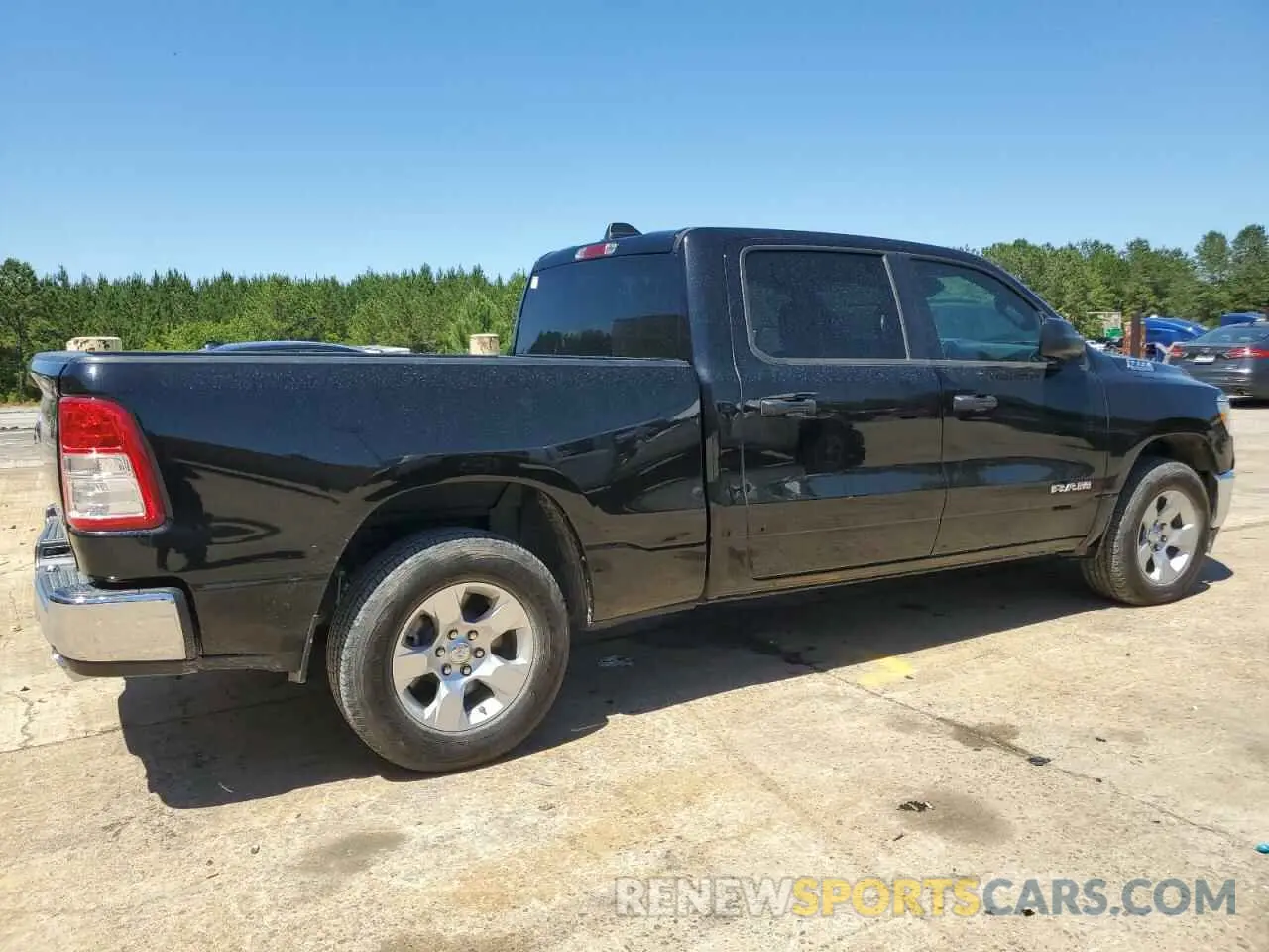 3 Photograph of a damaged car 1C6SRFMT4RN170133 RAM 1500 2024