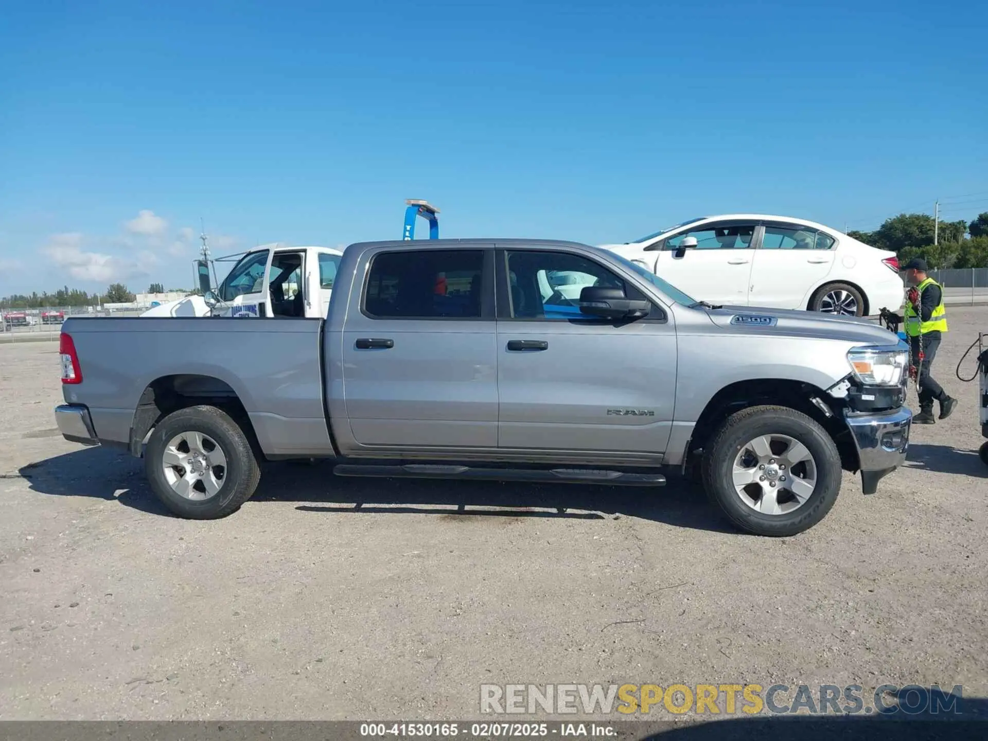 14 Photograph of a damaged car 1C6SRFMT5RN160517 RAM 1500 2024