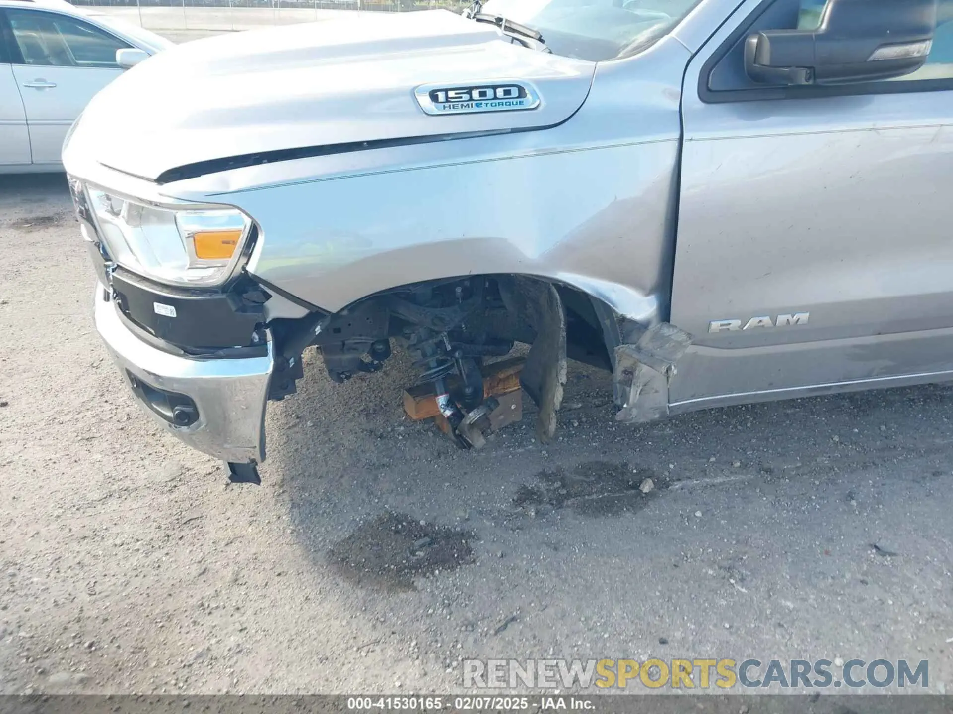 19 Photograph of a damaged car 1C6SRFMT5RN160517 RAM 1500 2024