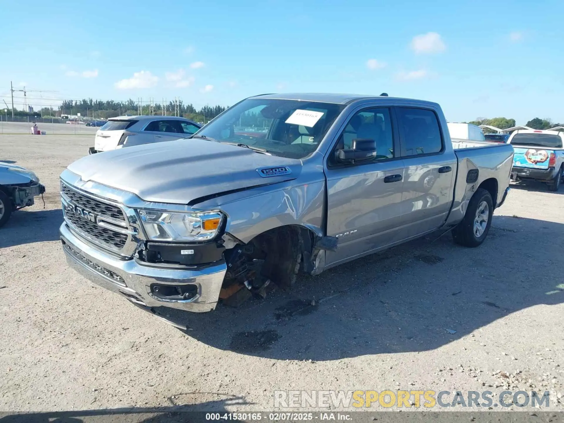 2 Photograph of a damaged car 1C6SRFMT5RN160517 RAM 1500 2024