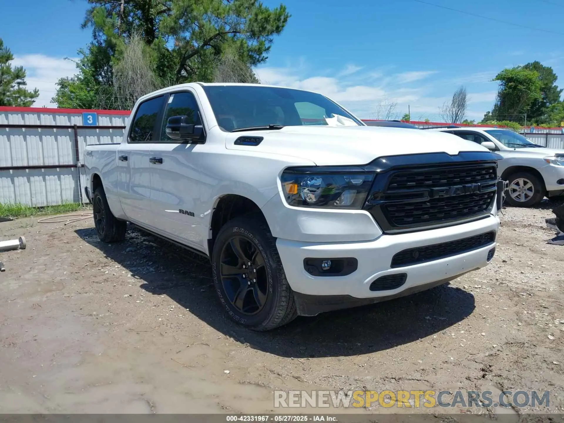 1 Photograph of a damaged car 1C6SRFMTXRN169472 RAM 1500 2024