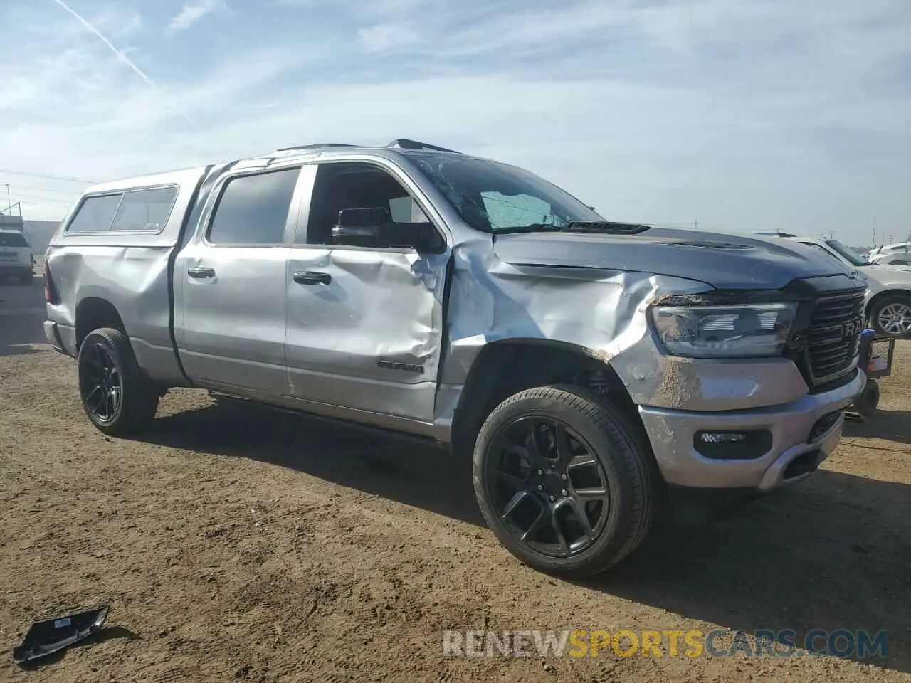 4 Photograph of a damaged car 1C6SRFRT5RN107891 RAM 1500 2024