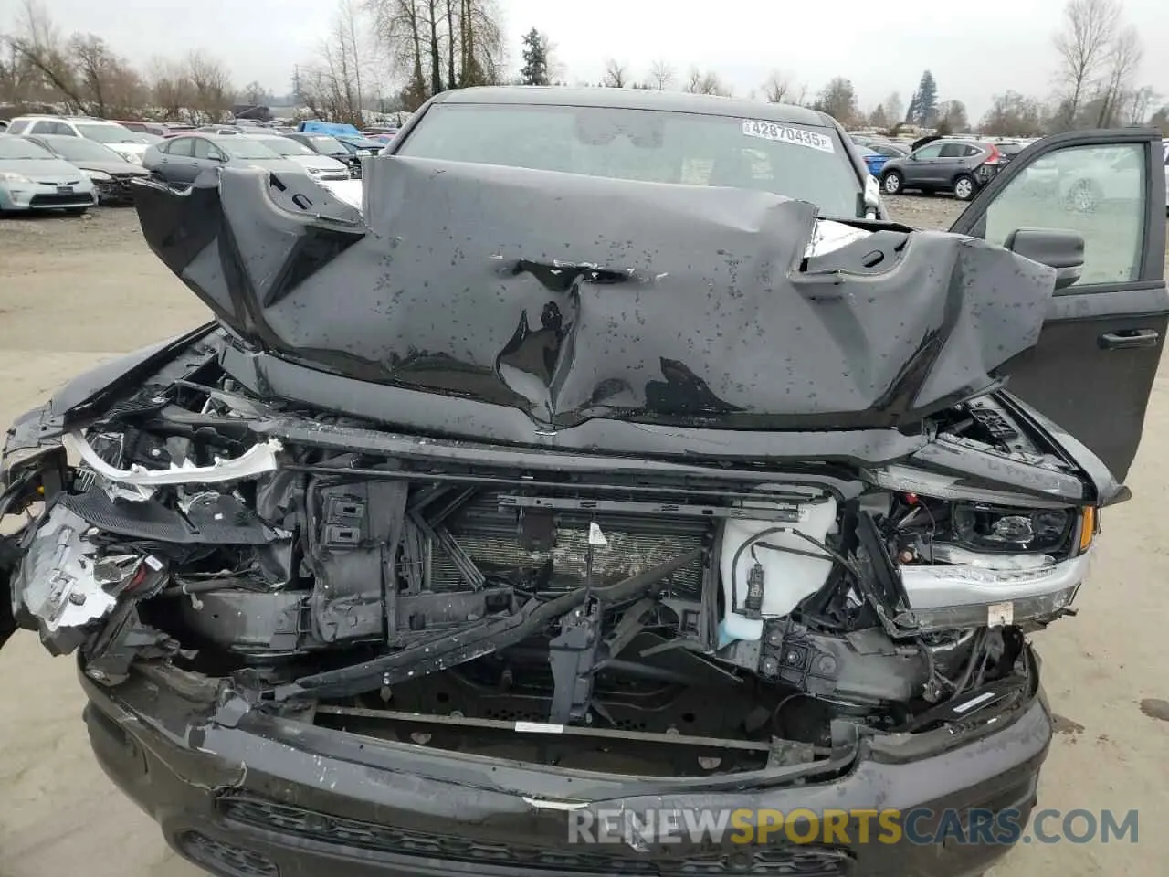 13 Photograph of a damaged car 1C6SRFRT9RN117808 RAM 1500 2024