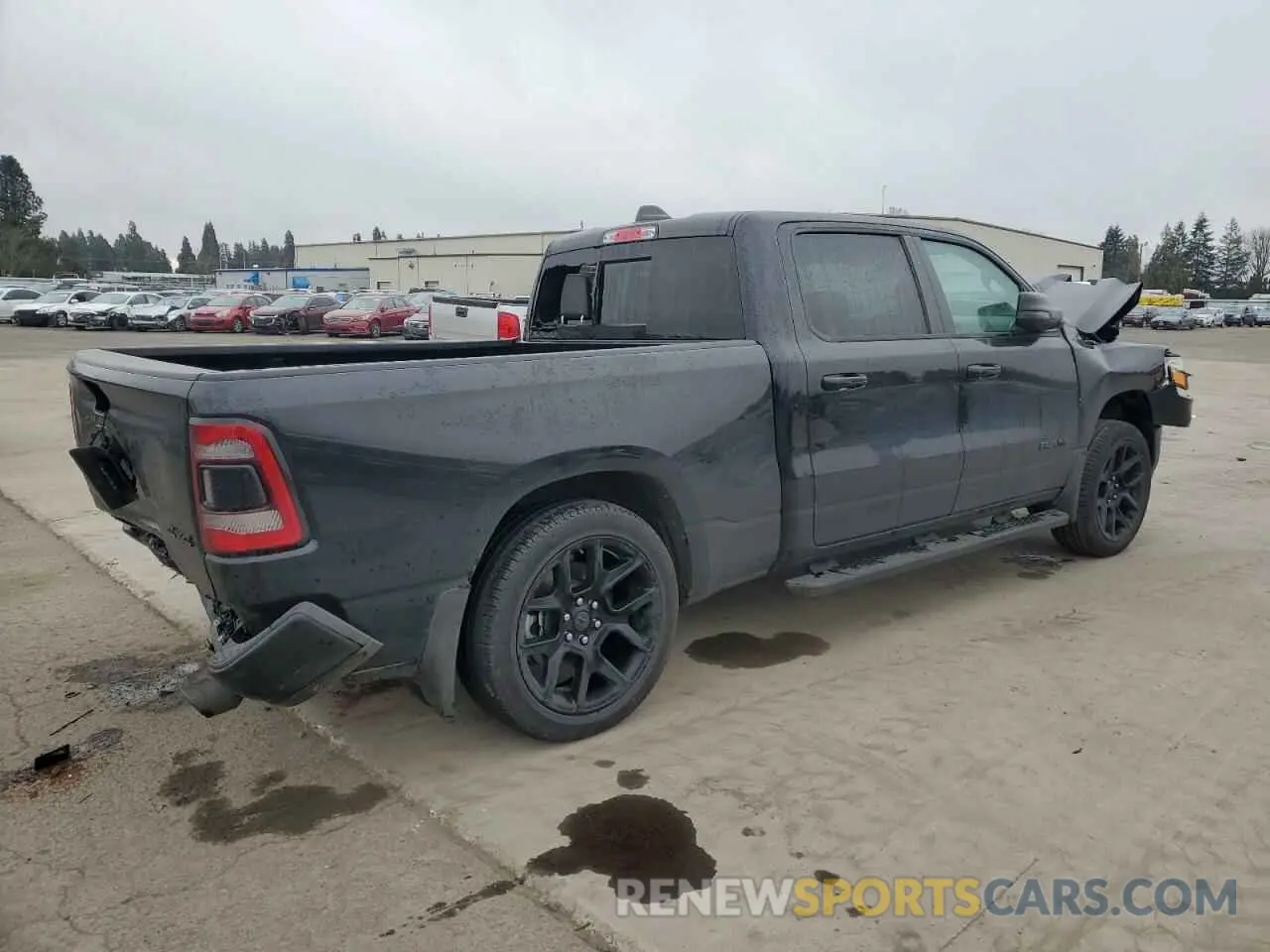 3 Photograph of a damaged car 1C6SRFRT9RN117808 RAM 1500 2024