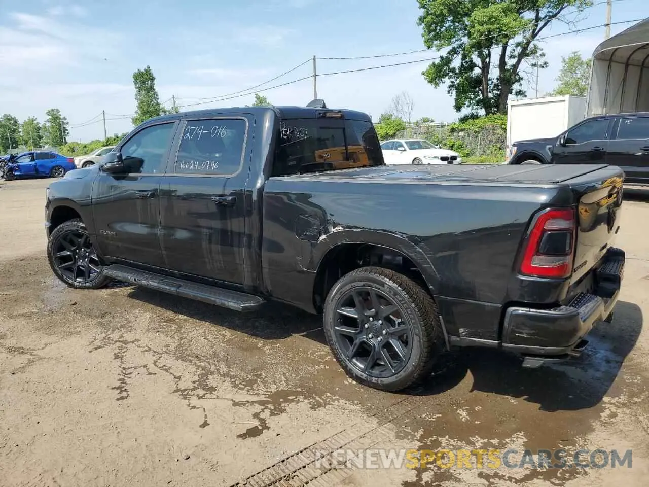 2 Photograph of a damaged car 1C6SRFTTXRN114585 RAM 1500 2024