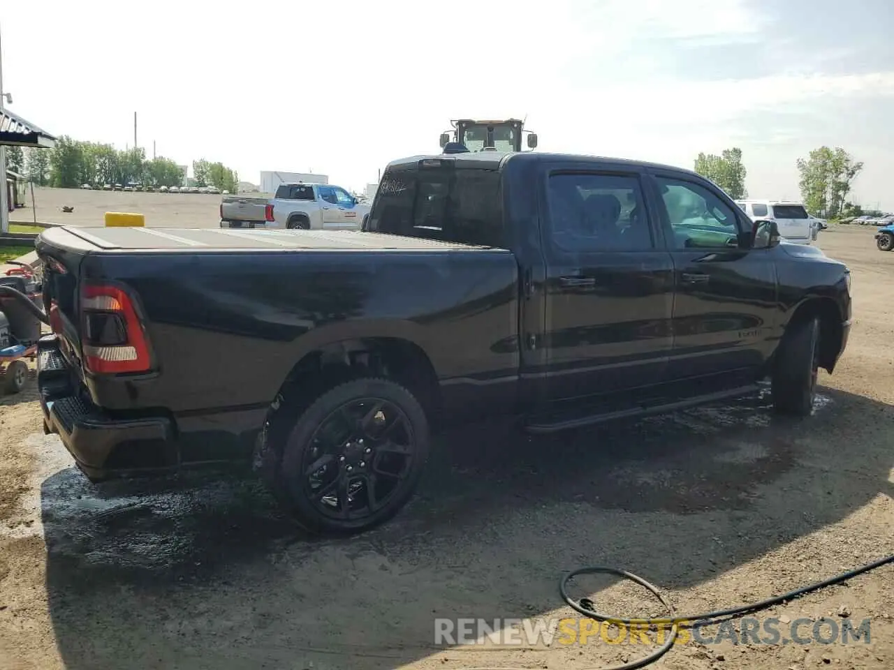 3 Photograph of a damaged car 1C6SRFTTXRN114585 RAM 1500 2024