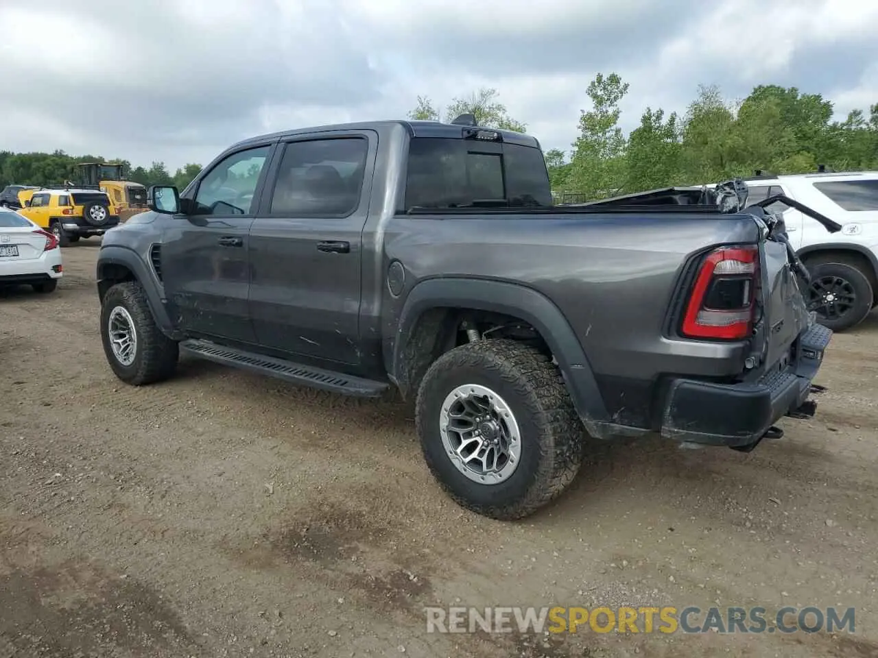 2 Photograph of a damaged car 1C6SRFU91RN141399 RAM 1500 2024