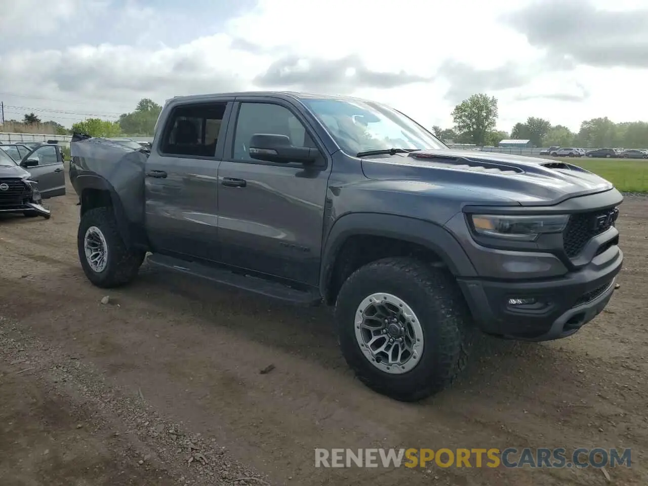 4 Photograph of a damaged car 1C6SRFU91RN141399 RAM 1500 2024