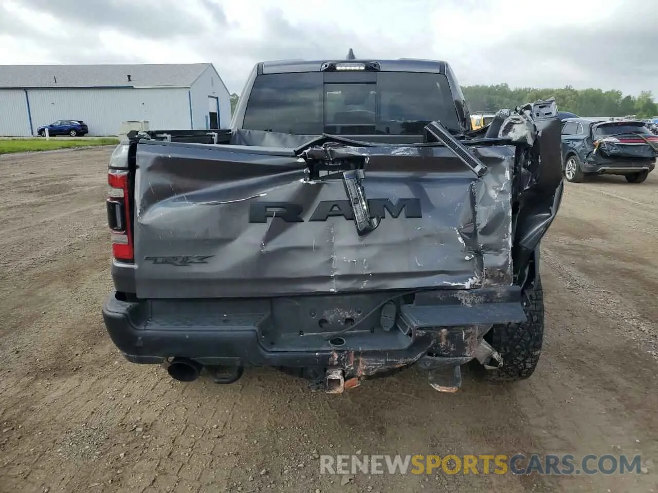 6 Photograph of a damaged car 1C6SRFU91RN141399 RAM 1500 2024