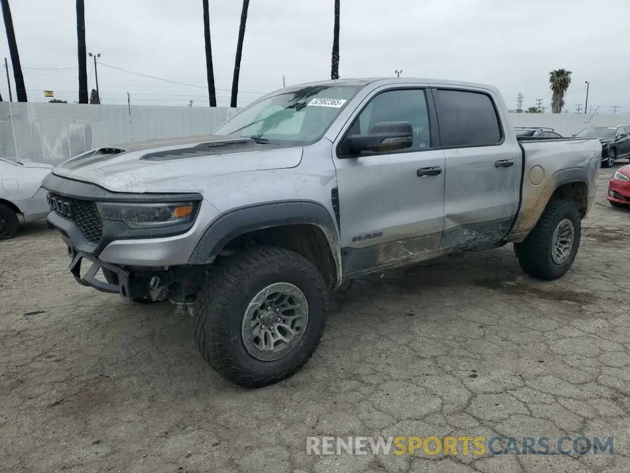 1 Photograph of a damaged car 1C6SRFU91RN223519 RAM 1500 2024