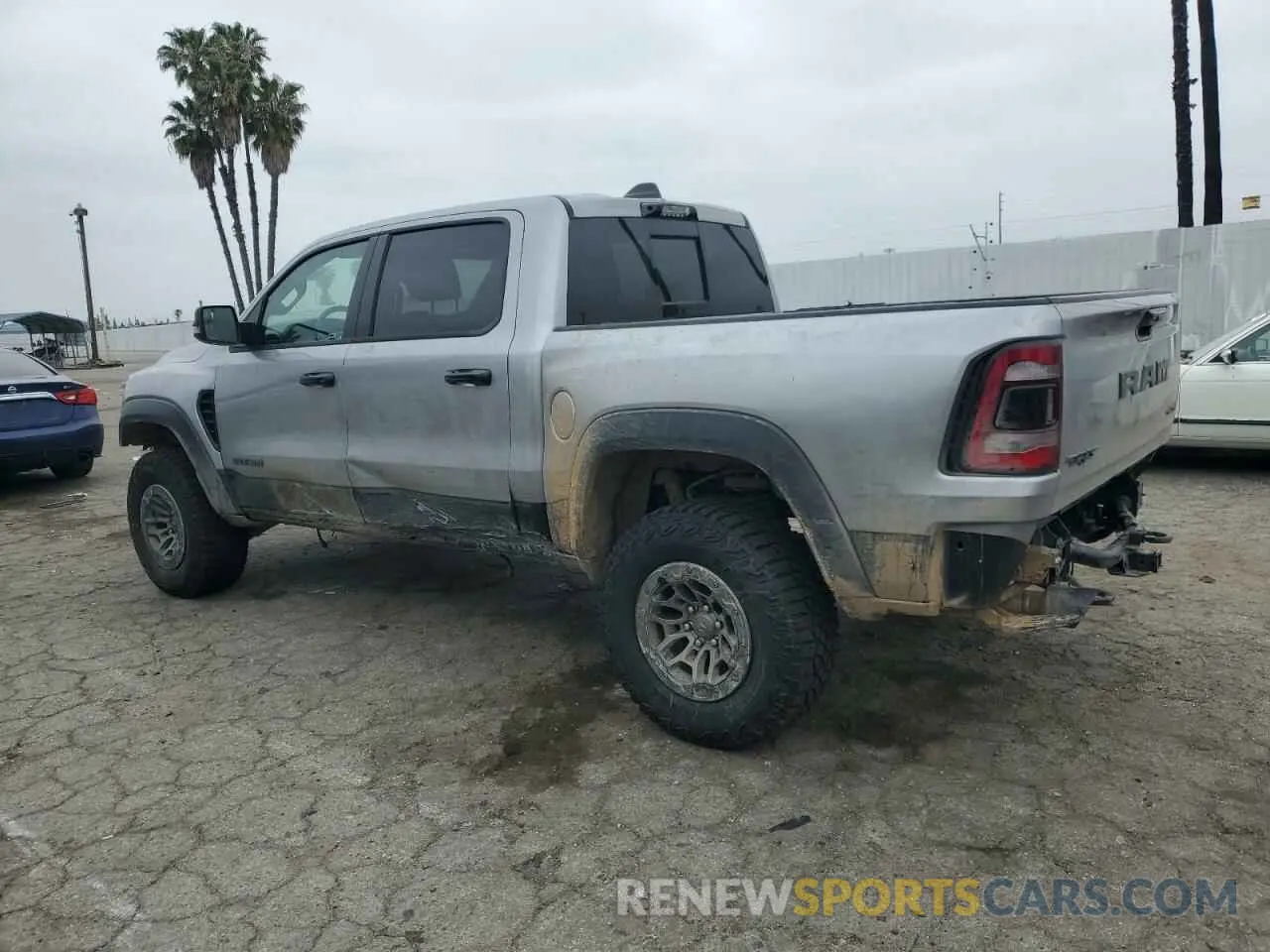 2 Photograph of a damaged car 1C6SRFU91RN223519 RAM 1500 2024