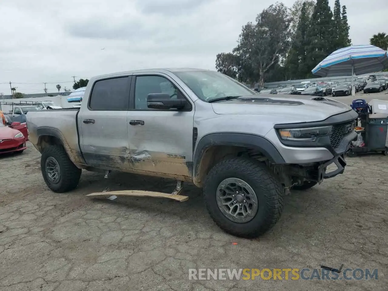 4 Photograph of a damaged car 1C6SRFU91RN223519 RAM 1500 2024