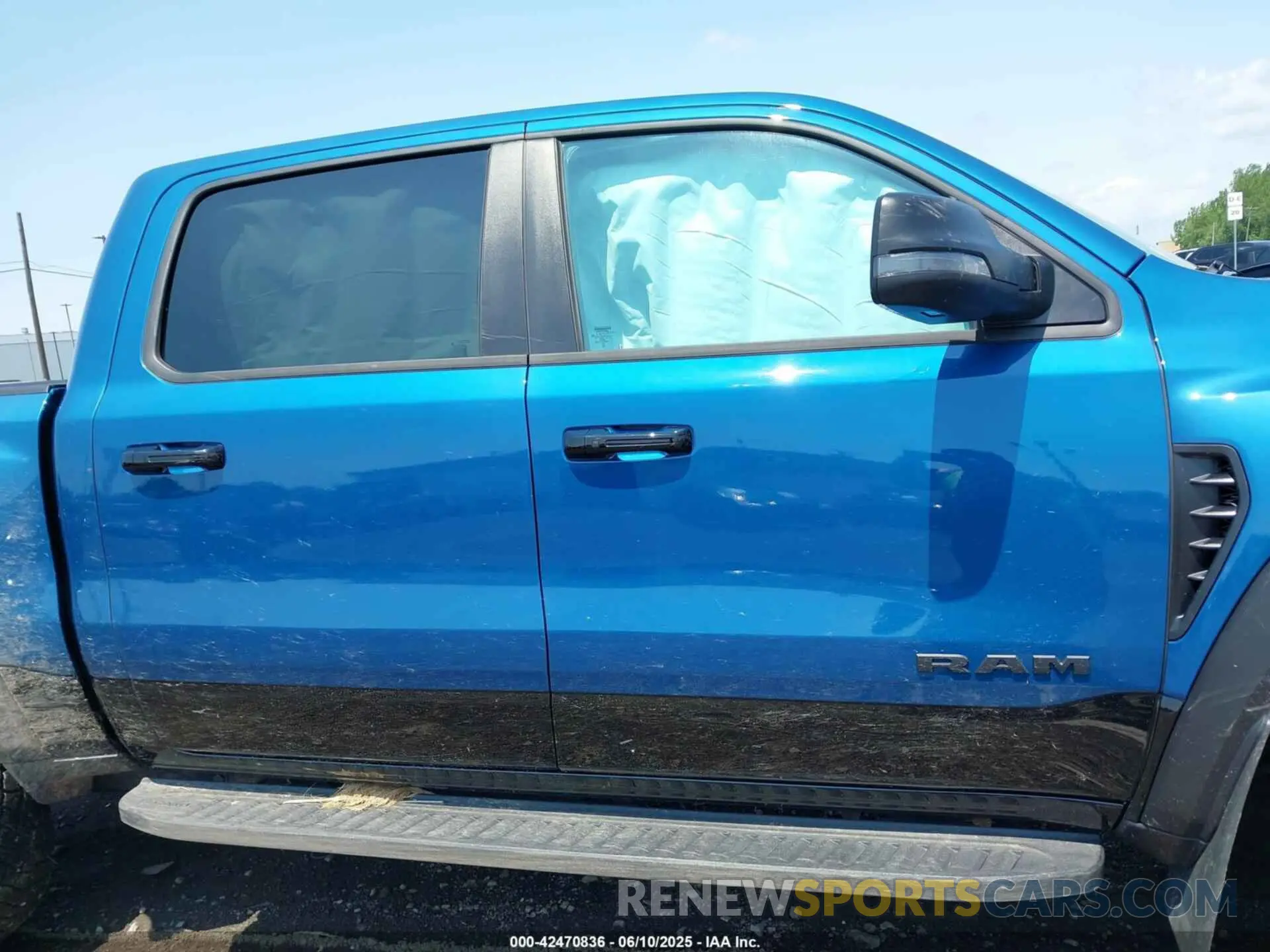 13 Photograph of a damaged car 1C6SRFU95RN187320 RAM 1500 2024