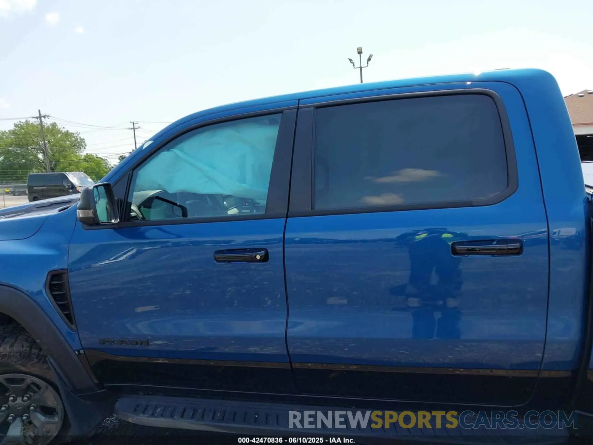 14 Photograph of a damaged car 1C6SRFU95RN187320 RAM 1500 2024