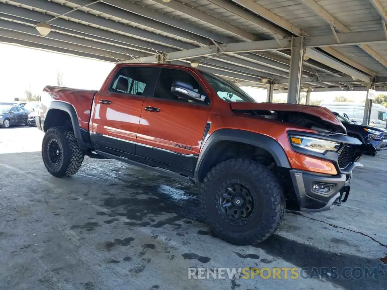 4 Photograph of a damaged car 1C6SRFU95RN223121 RAM 1500 2024