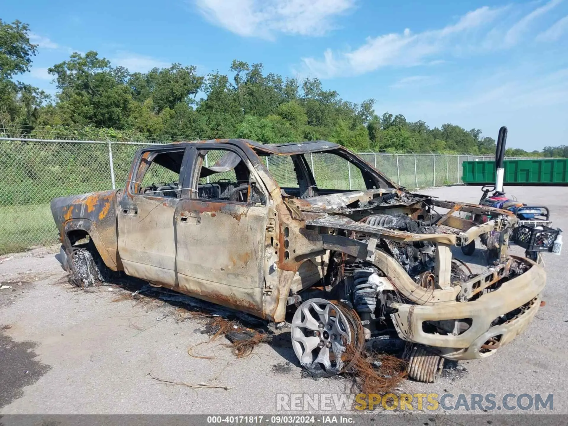 1 Photograph of a damaged car 1C6SRFU9XRN113794 RAM 1500 2024