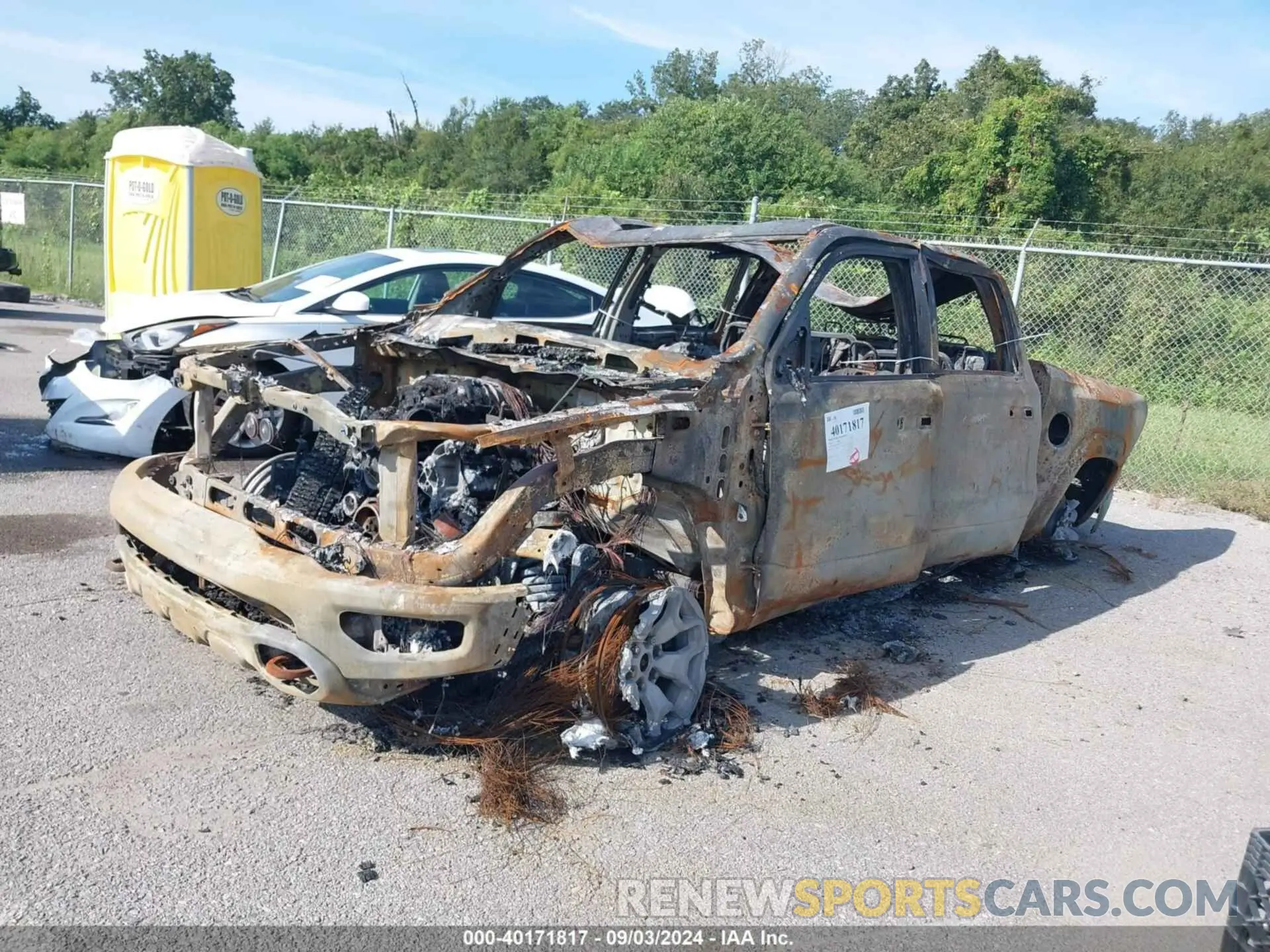 2 Photograph of a damaged car 1C6SRFU9XRN113794 RAM 1500 2024