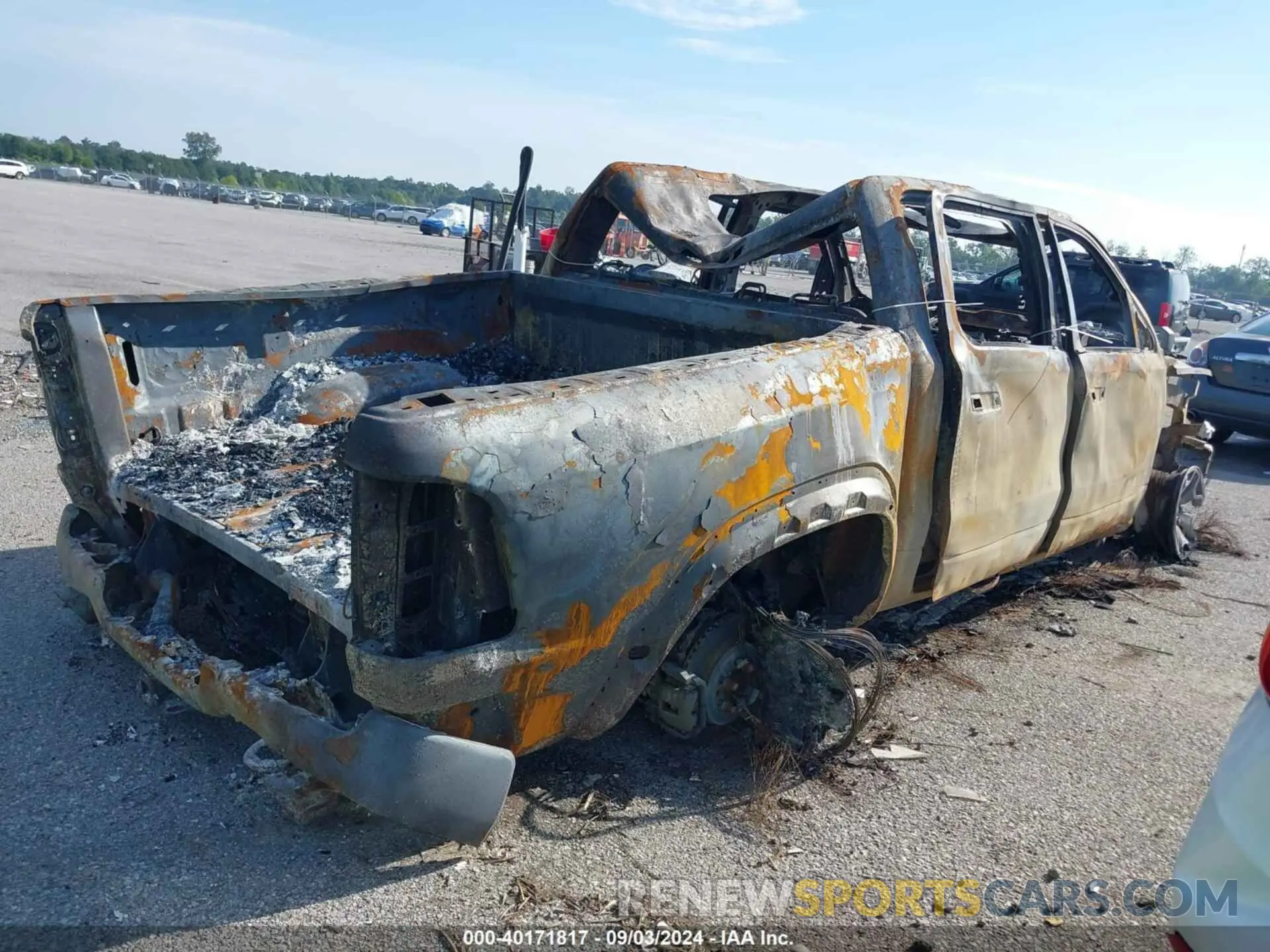 4 Photograph of a damaged car 1C6SRFU9XRN113794 RAM 1500 2024