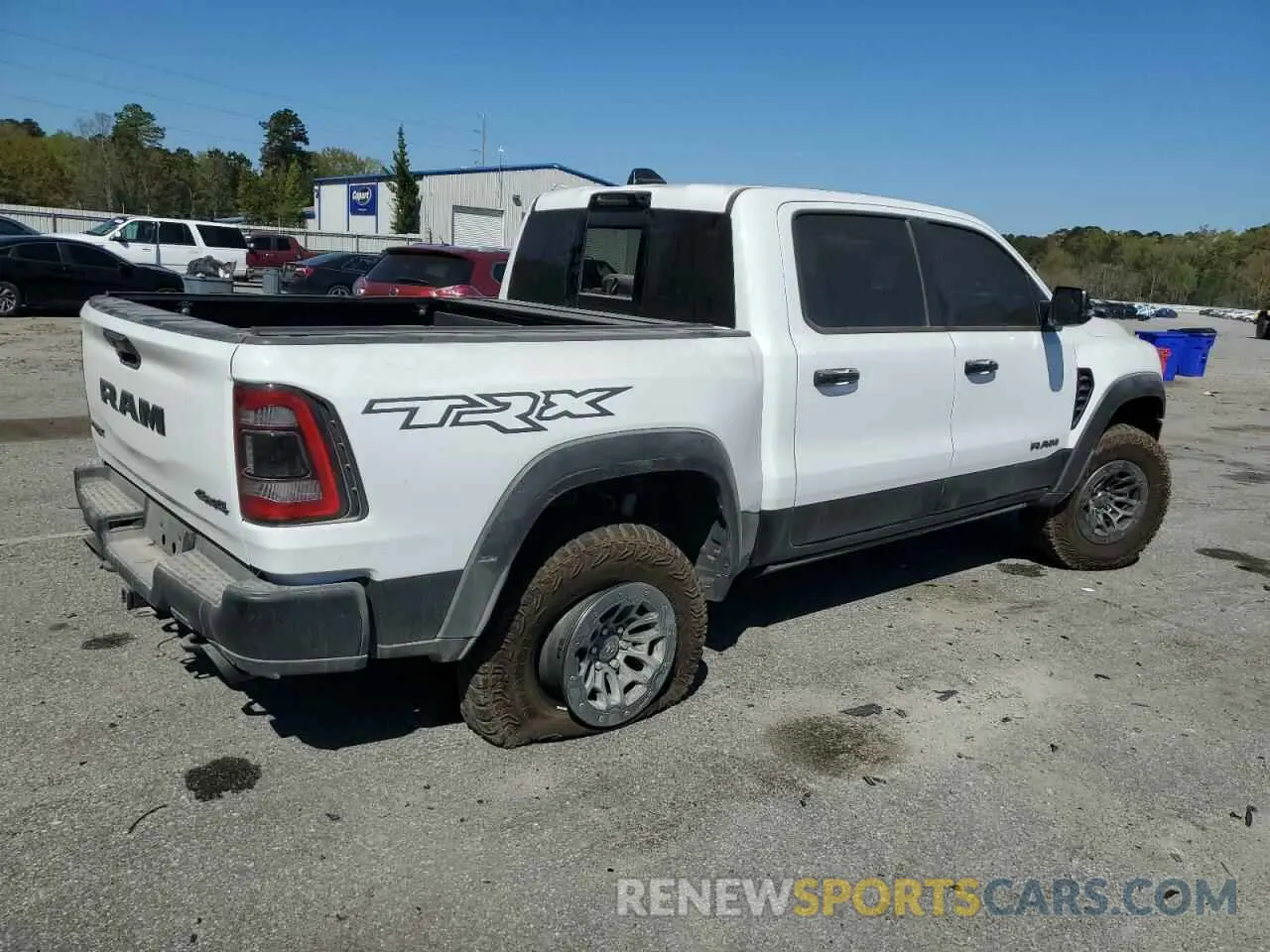 3 Photograph of a damaged car 1C6SRFU9XRN195722 RAM 1500 2024