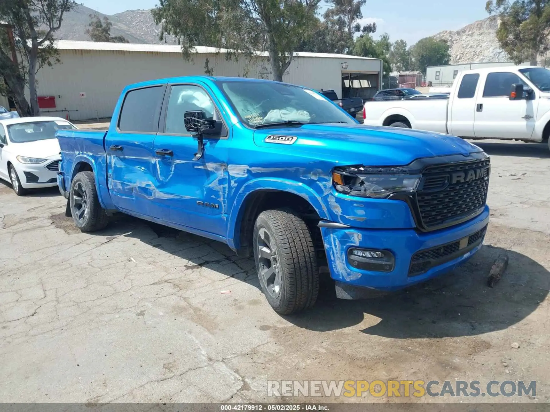 1 Photograph of a damaged car 1C6RREFP0SN647137 RAM 1500 2025