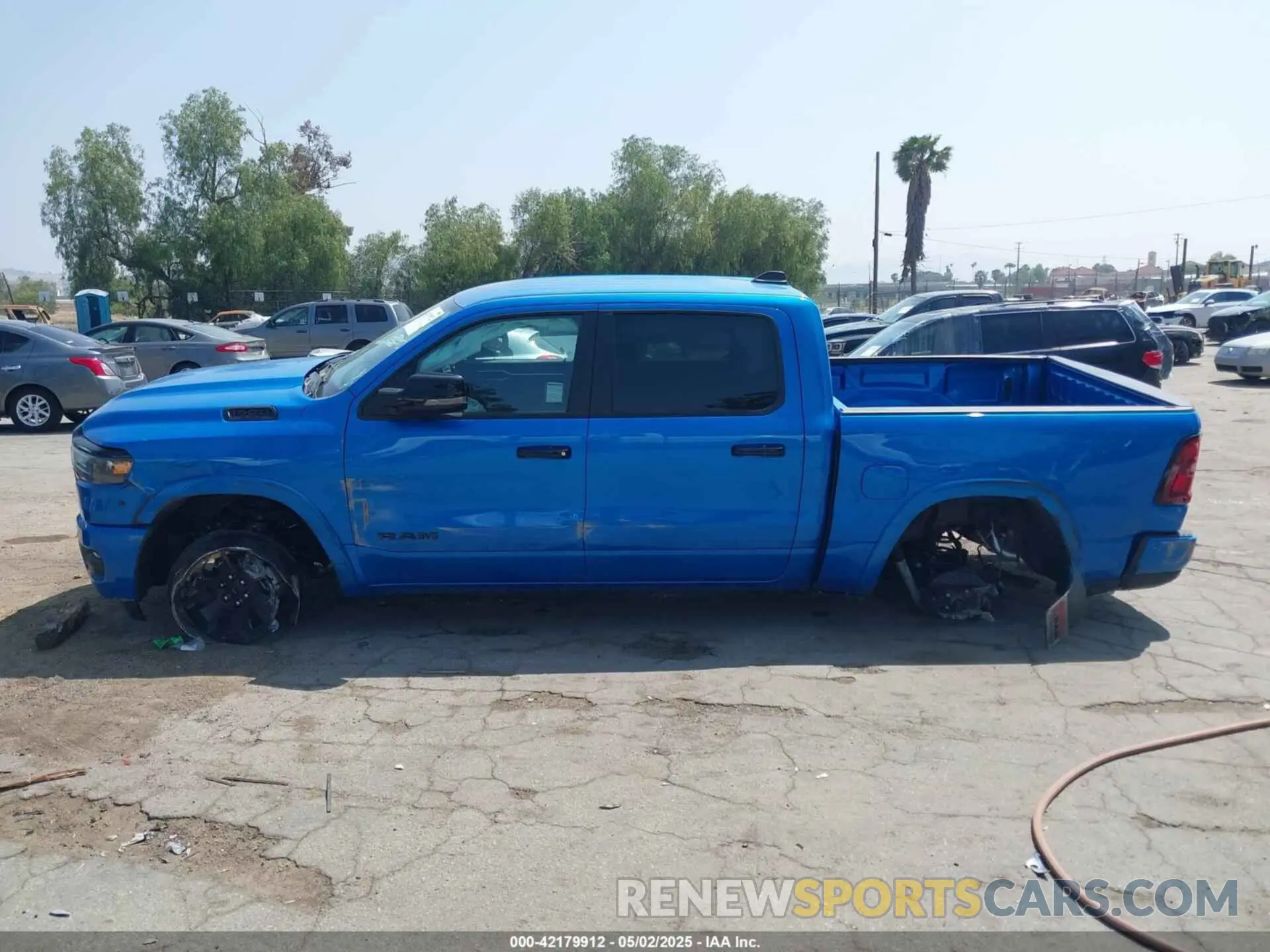 13 Photograph of a damaged car 1C6RREFP0SN647137 RAM 1500 2025