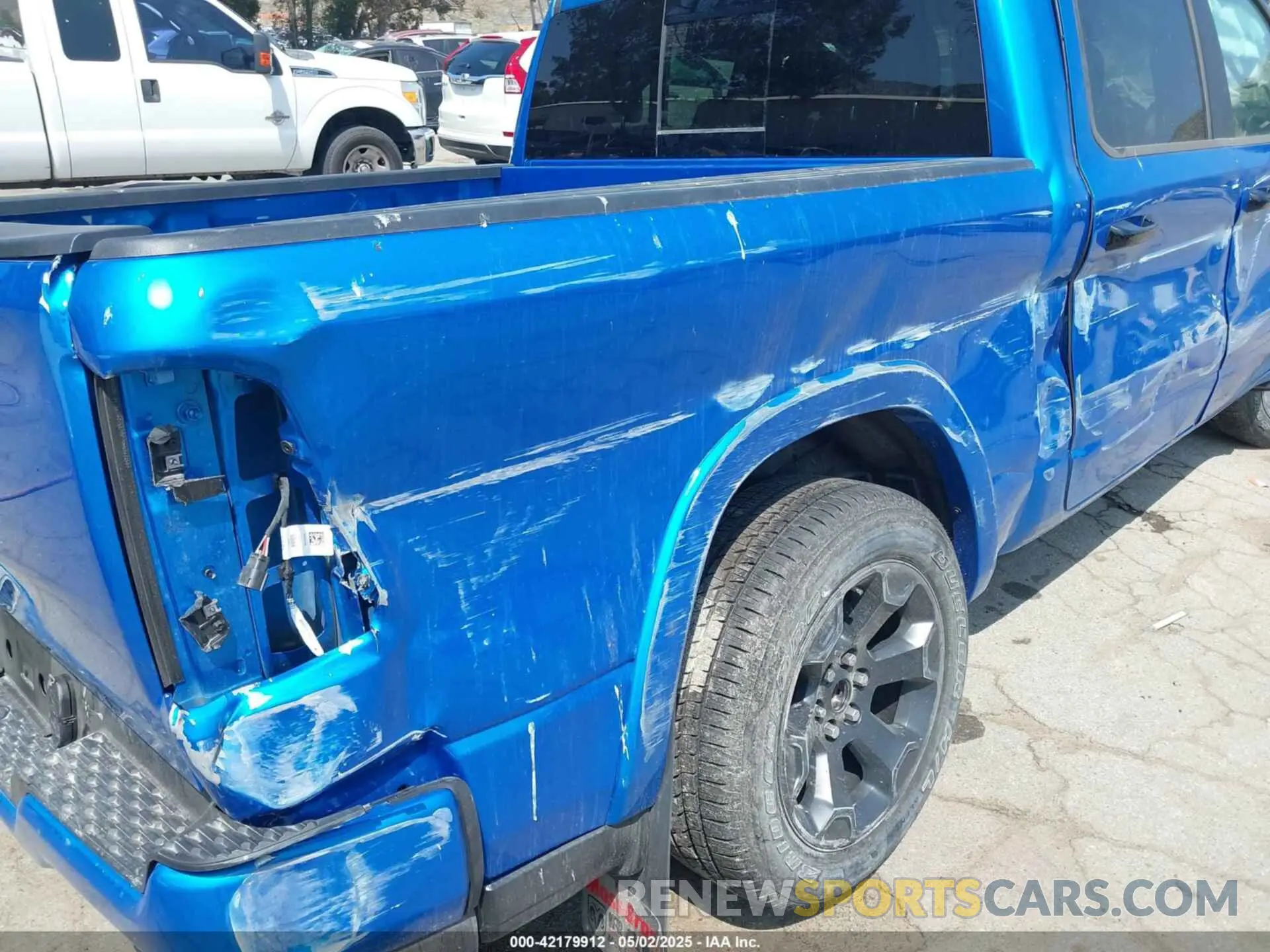 18 Photograph of a damaged car 1C6RREFP0SN647137 RAM 1500 2025