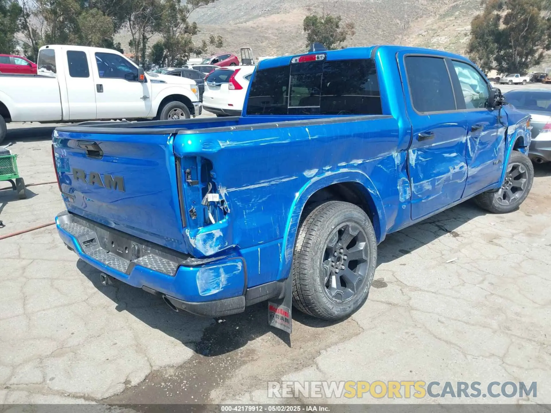 4 Photograph of a damaged car 1C6RREFP0SN647137 RAM 1500 2025