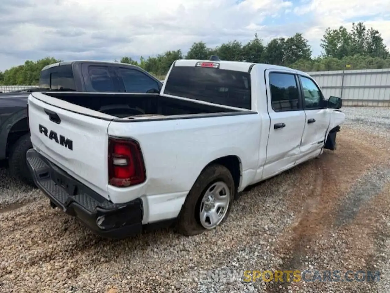 3 Photograph of a damaged car 1C6RREGG8SN552310 RAM 1500 2025